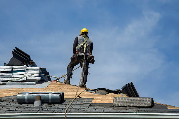 Professional Flat Roof Repair technician working in Greensburg, LA